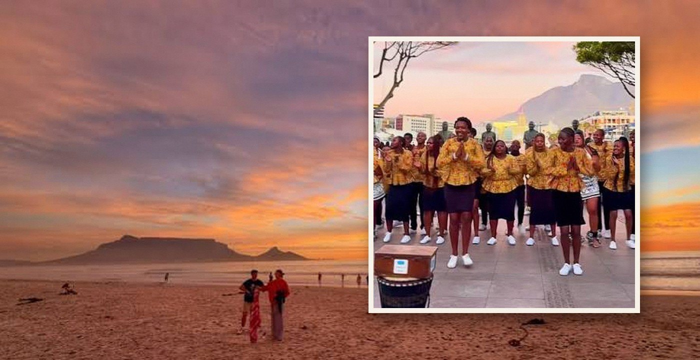 The Ithemba Youth Choir overlaid on a sunset over Table Mountain